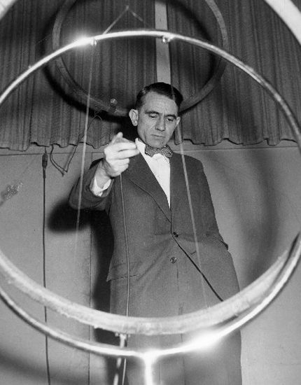 Pierre Schaeffer with metal ring contraptions